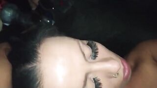The girl is getting fucked on the back seat of a BMW