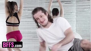 A yoga enthusiast is having fun with his coach and classmates