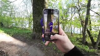 A cum shot in the mouth of a girl in a public place outdoors
