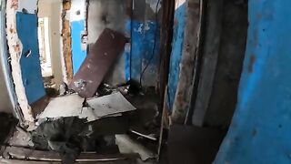 An exhibitionist girl is walking in a ruin with her hot girlfriend