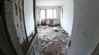 An exhibitionist girl is walking in a ruin with her hot girlfriend