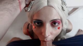 Crazy Harley Quinn gets her asshole stuffed with a huge butt plug while giving a blowjob