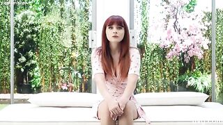 A red-haired girl with a stunning body tries her luck at modeling