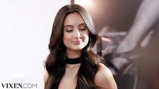 The cute girl is selling underwear and she shows it to the client in a provocative way
