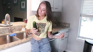 The girl was preparing lunch and played with her pussy in the kitchen