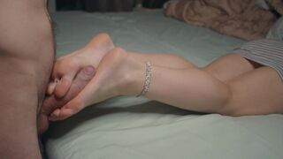 A petite girl shows off her small feet and skills in a steamy session