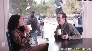 Ebony babe Paris The Muse gets her mouth full of ten cocks in a bukkake