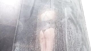 The girl has a wet pussy orgasm in the shower from masturbation