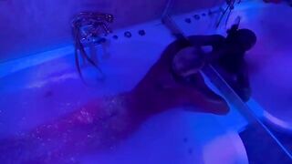 Blonde plays with sex toys in the bathroom