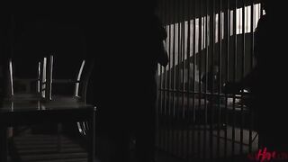 A passionate encounter between two women behind bars, filled with desire
