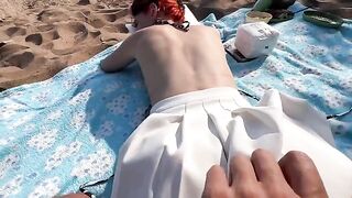 The couple has sex on the public beach and enjoys the thrill of being caught