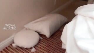 A girl is sharing a bed with her friend who has some wild habits