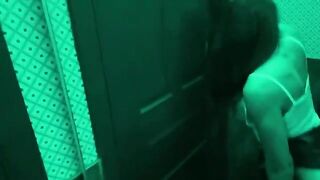 A girl is having fun with her roommate in the toilet bar