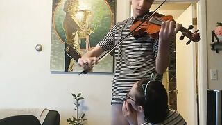 The guy tried to practice the violin but was interrupted by his passionate girlfriend