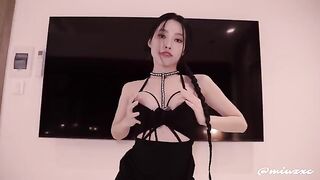 Asian beauty in a black dress has no holes left untouched