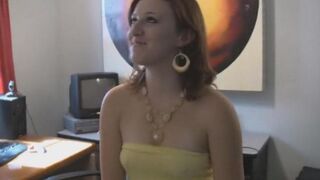 A woman with big natural tits is completely naked in the bedroom on the bed