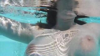 Fella plays with dildo in his pool, almost gets caught