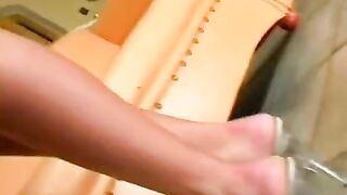 Beautiful woman masturbating on a leather chair in eporn style