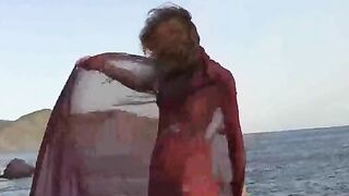 Nude girl on the beach with small boobs gets spanked