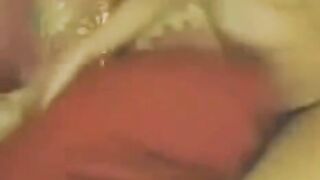 Young Chinese woman masturbating in front of a webcam