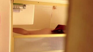 A girl has no shame and cums on camera in the shower