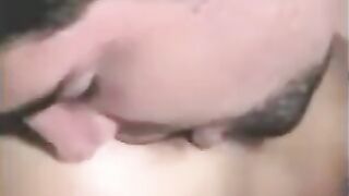A guy fucked with a strapon and the second girl fingered his dick
