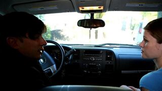 The hot girl is doing a blowjob while riding in a car with a guy