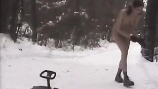 Nude girls throw snowballs at each other in the winter