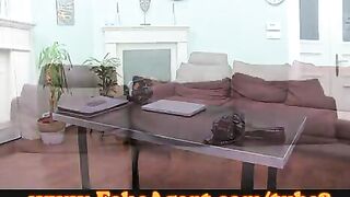 An attractive girl demonstrates her blowjob skills on the couch