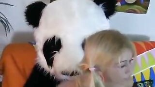 A cute girl has sex with a bear in the style of panda