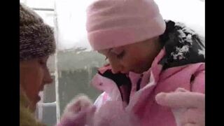 Girls are having fun with each other on a cold winter day