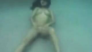 Busty brunette beauty gets fucked under the open sky in ocean