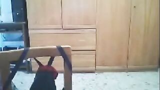 A woman fucks in front of her husband's webcam