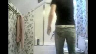 A girl was peeing and someone spied on her with a hidden camera