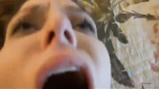 A man gets his dick sucked by a woman at home, showcasing intense passion