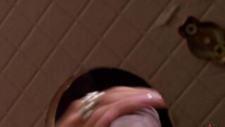 A woman has sex right in the toilet hole