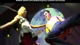 A man fucks a girl in the anus in the club during a porn show