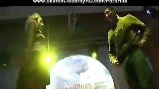 A man fucks a girl in the anus in the club during a porn show