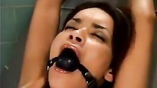 Girl gets fucked by a bald man using a sex machine in hardcore BDSM