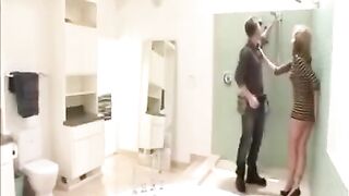 The wife fucked with a plumber and her husband in an intense shower scene