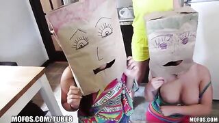 Girls are wearing shopping bags on their heads and having sex
