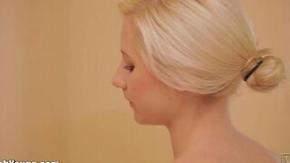 A cute girl brushes her teeth and masturbates with a toothbrush handle