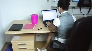 The boss pushed his young secretary on the table