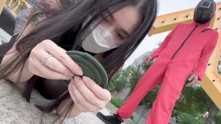 A hot Chinese girl participates in a squid game with swag