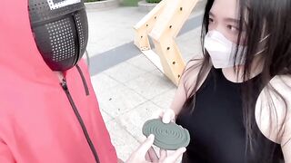 A hot Chinese girl participates in a squid game with swag