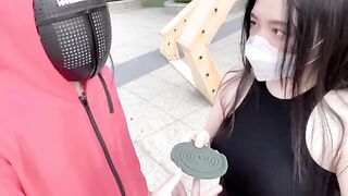 A hot Chinese girl participates in a squid game with swag