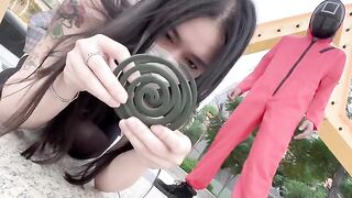 A hot Chinese girl participates in a squid game with swag