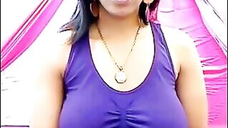 Her nipples are standing through the T-shirt. She's very excited about something