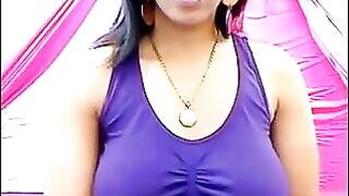 Her nipples are standing through the T-shirt. She's very excited about something