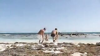 Bikini girls have sex on the beach with two guys